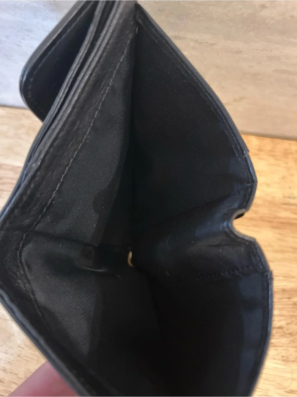 Vintage smooth black leather bifold wallet from Talbot